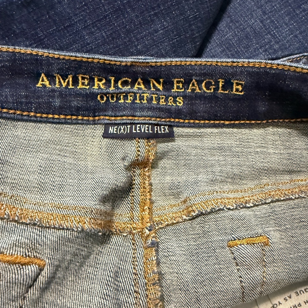 American Eagle Outfitters Dark Blue Stretch Jeans with Gold Stitching